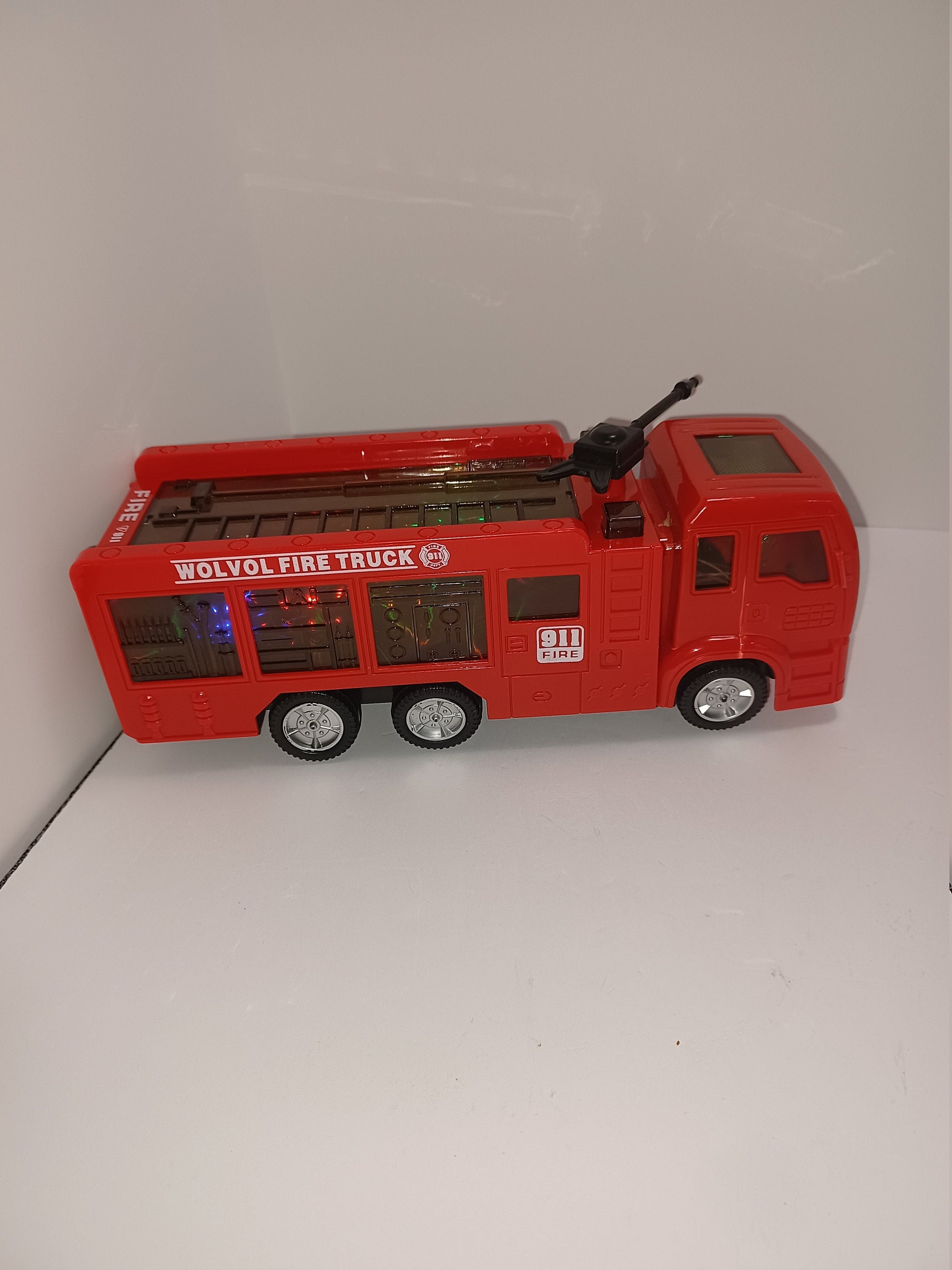 WolVol Firetruck Fire Engine 3D Lighting Effects Sounds Lights Sirens 3D Works Great Shape - Firetruck - Pretend Play - Toy Firetruck