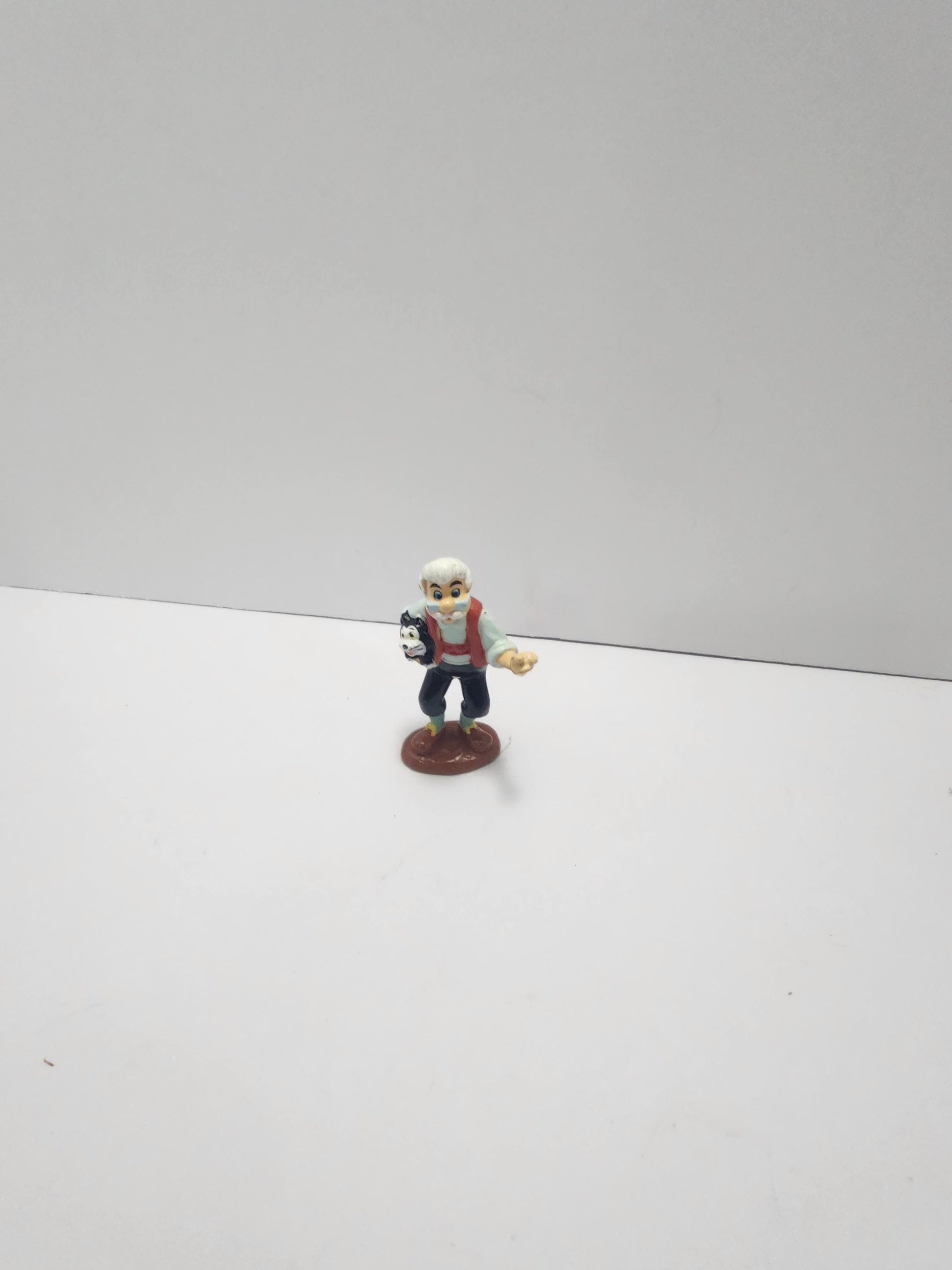 Geppetto Holding Figaro From Disney's Pinocchio - Pinocchio - Pinocchio Toys - Disney - Disney Toys - Geppetto - Figaro - Disney Gifts