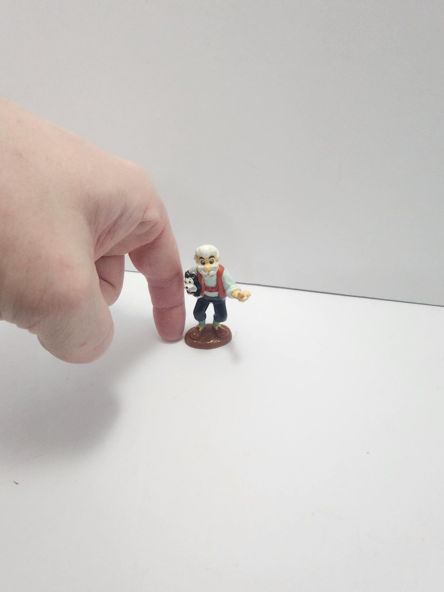 Geppetto Holding Figaro From Disney's Pinocchio - Pinocchio - Pinocchio Toys - Disney - Disney Toys - Geppetto - Figaro - Disney Gifts
