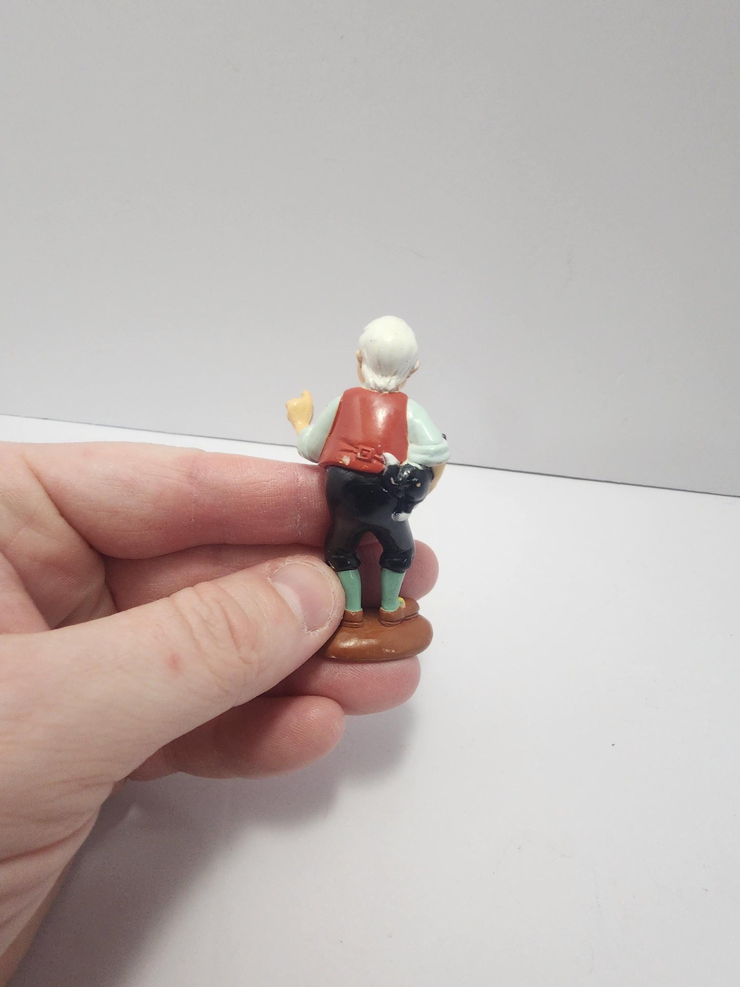 Geppetto Holding Figaro From Disney's Pinocchio - Pinocchio - Pinocchio Toys - Disney - Disney Toys - Geppetto - Figaro - Disney Gifts